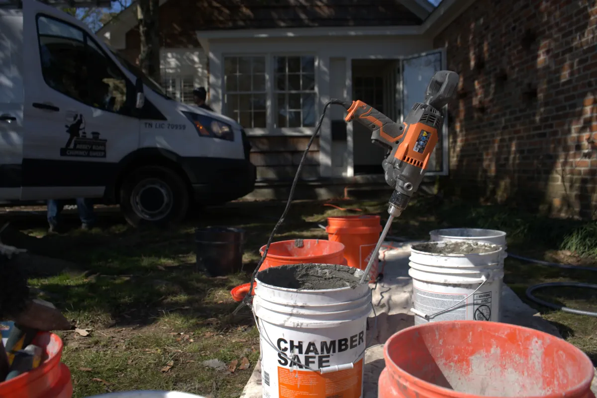 Abbey Road technician rebuilding a damaged chimney in the Greater-Memphis area